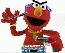 Elmo waving a gun and knife