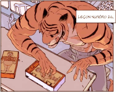 A tiger practices using his fingers to do delicate work.