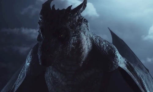A darkly-lit shot of the dragon showing his head, shoulders and upper torso.