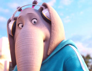Meena the elephant, wearing headphones.