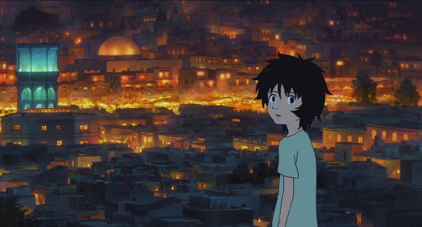 A young boy stands overlooking a city lit up at night.